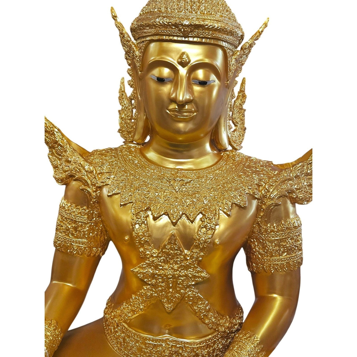 Close view of the 72-inch cast bronze Thai angel's face and gold crown