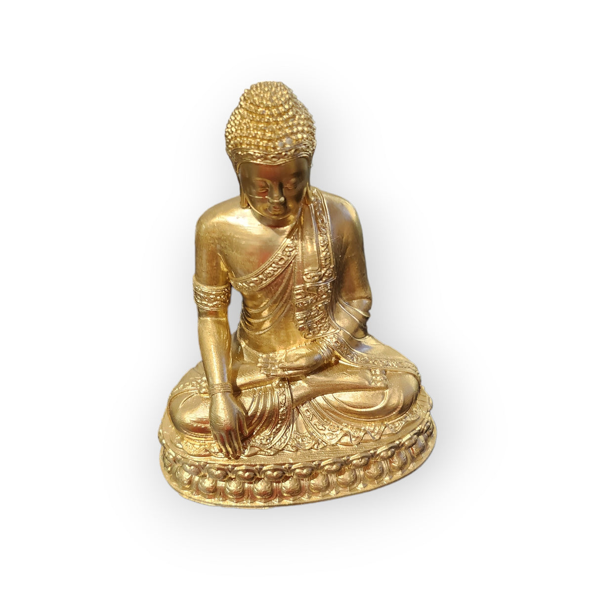 Gold painted 3D-printed Buddha figurine seated in the earth-touching pose on a layered base
