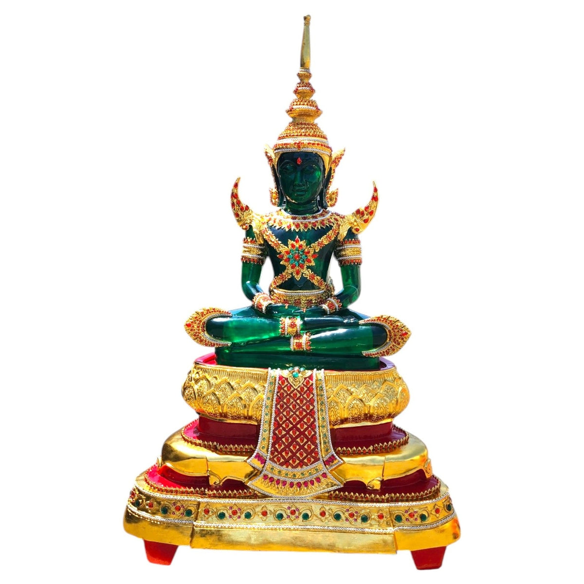 Emerald Buddha replica in green with gold attire on a tiered red and gold base, front view