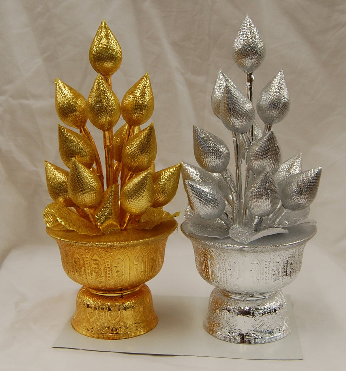 Pair of gold and silver lotus bud altar decorations