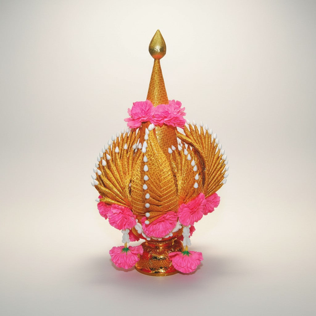 Buddhist altar decoration with gold and silver folded petals and pink flower garlands