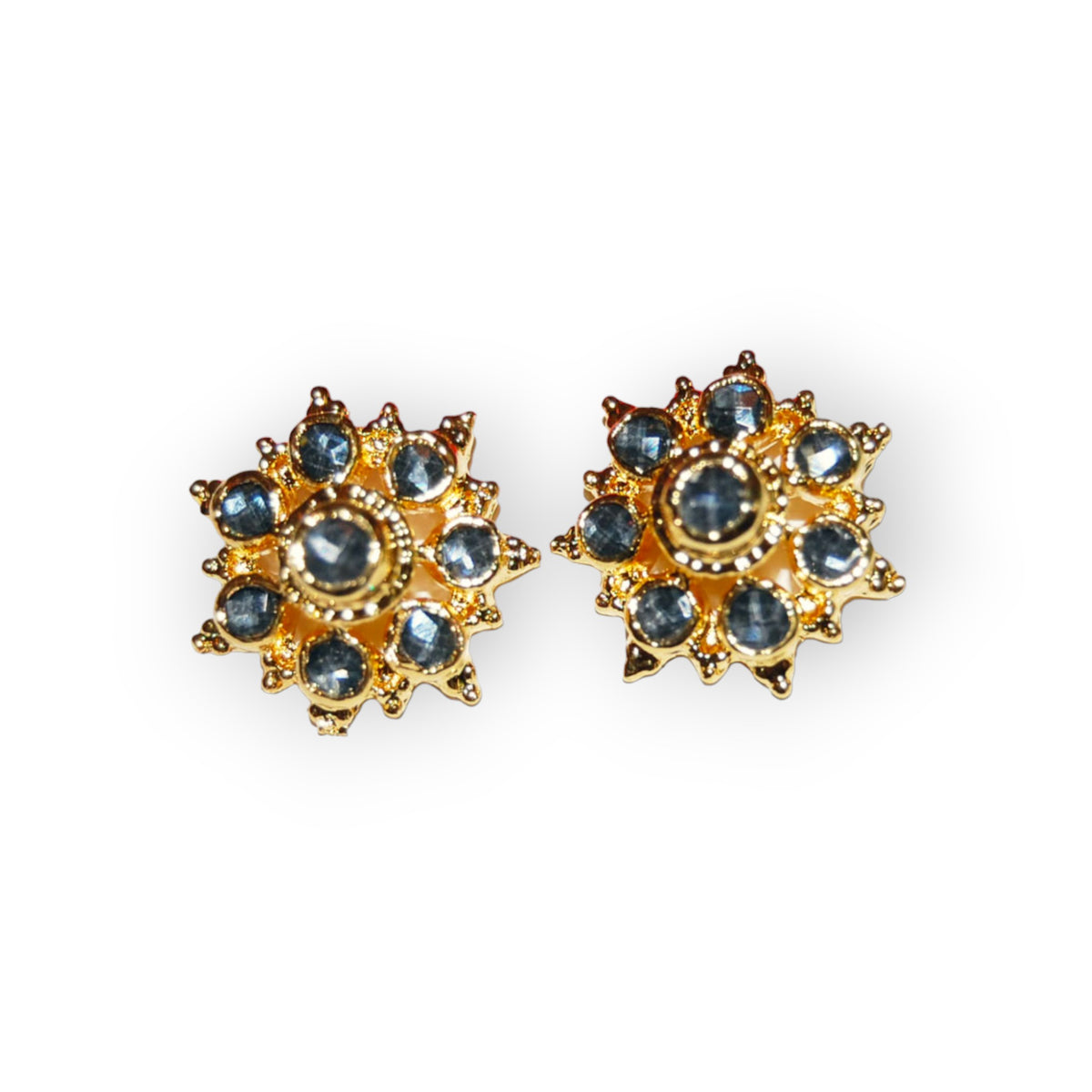 Gold-dipped flower stud earrings with blue-grey stones