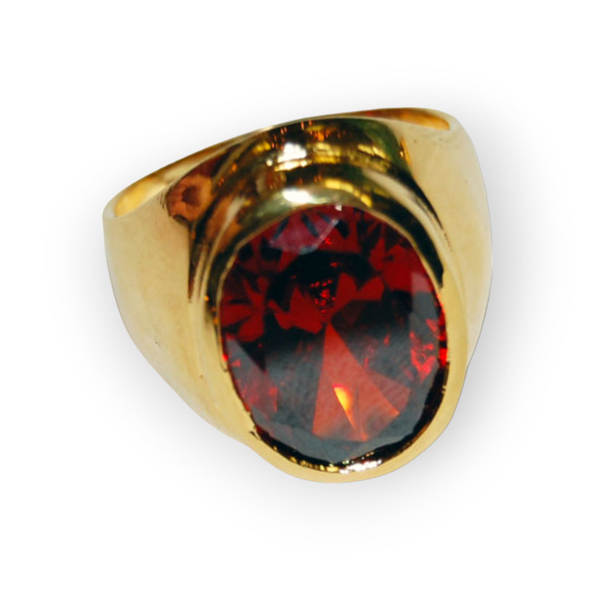 Another view of the men's gold-dipped size 9 ring with an oval dark red synthetic stone in a smooth bezel on a wide band