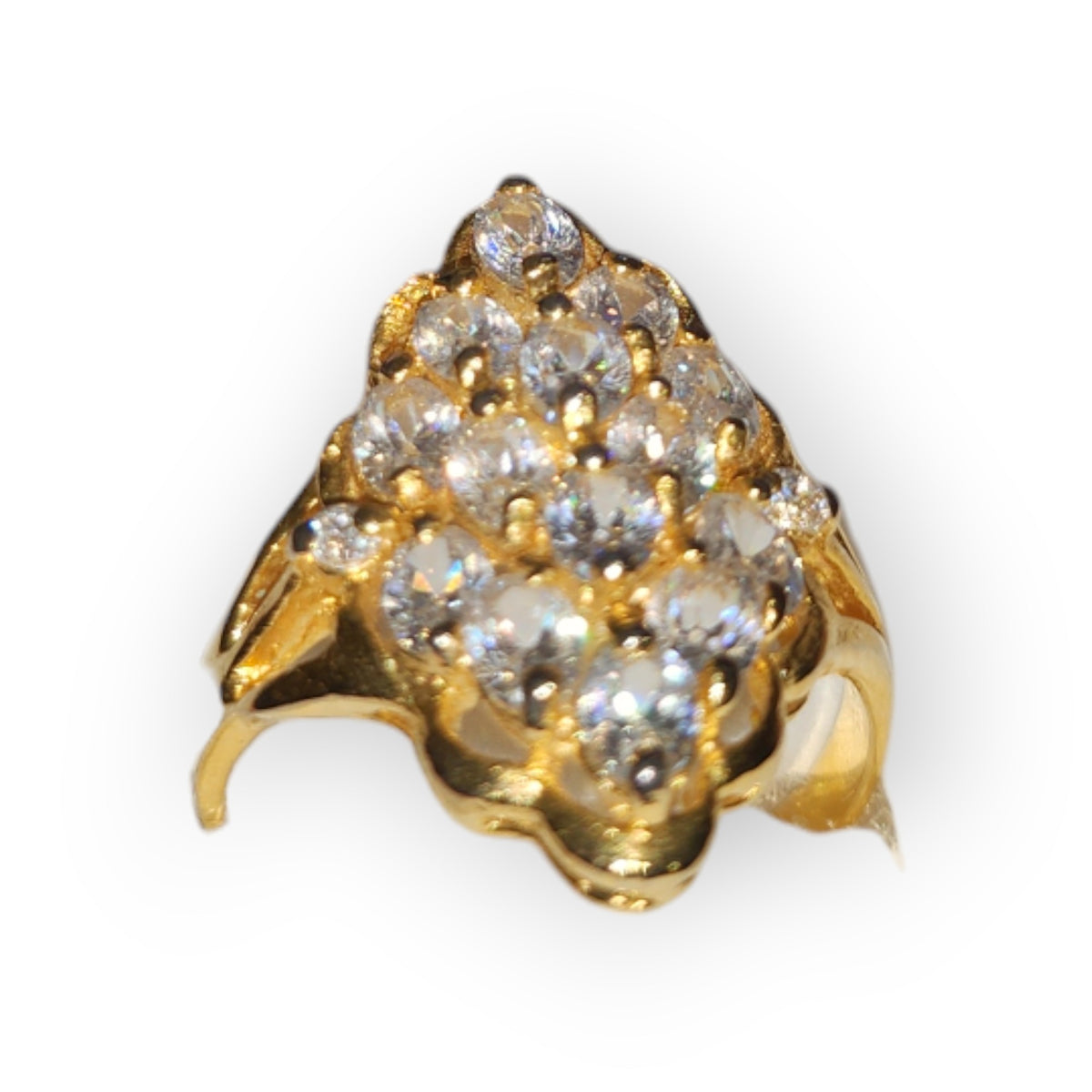 Another view of the gold-dipped size 6 ring with a pointed cluster of clear round stones on a plain gold-colored band