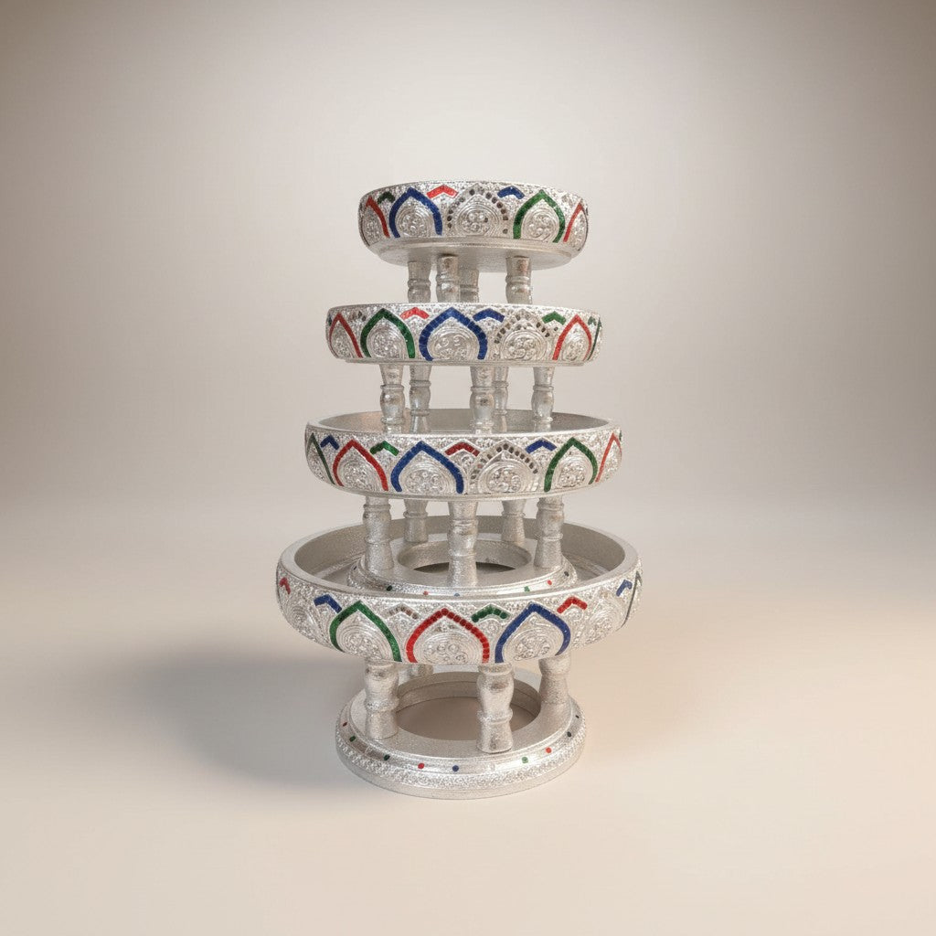 Four-piece stacking ceremonial bowl set in silver finish with colored trim