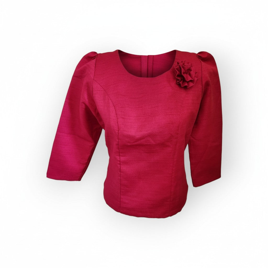 Raspberry Thai-Lao blouse with flower brooch, three-quarter sleeves