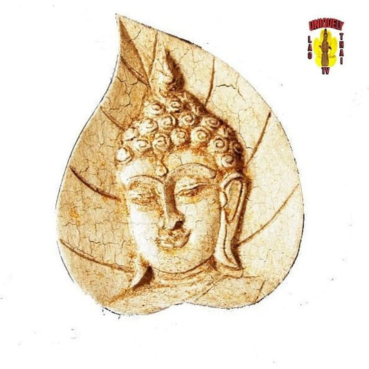 Another view of the cream and gold carved wooden leaf plaque with a Buddha face in the center, 7 by 6 inches