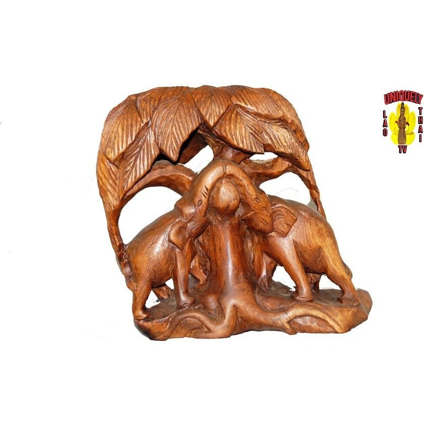 Elephants Playing Under a Tree