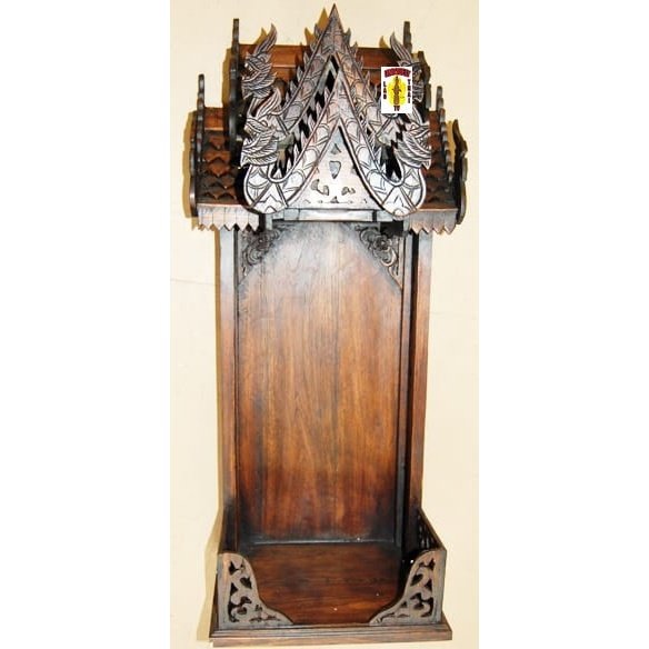 Thai spirit house altar with carved roof, front view
