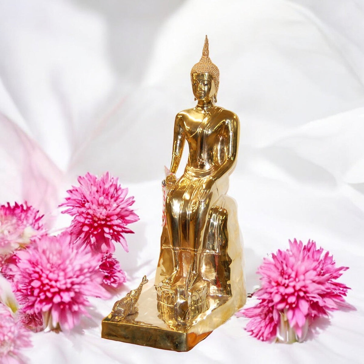 Cast bronze seated Wednesday evening Buddha, 9 inches, shown with pink flowers