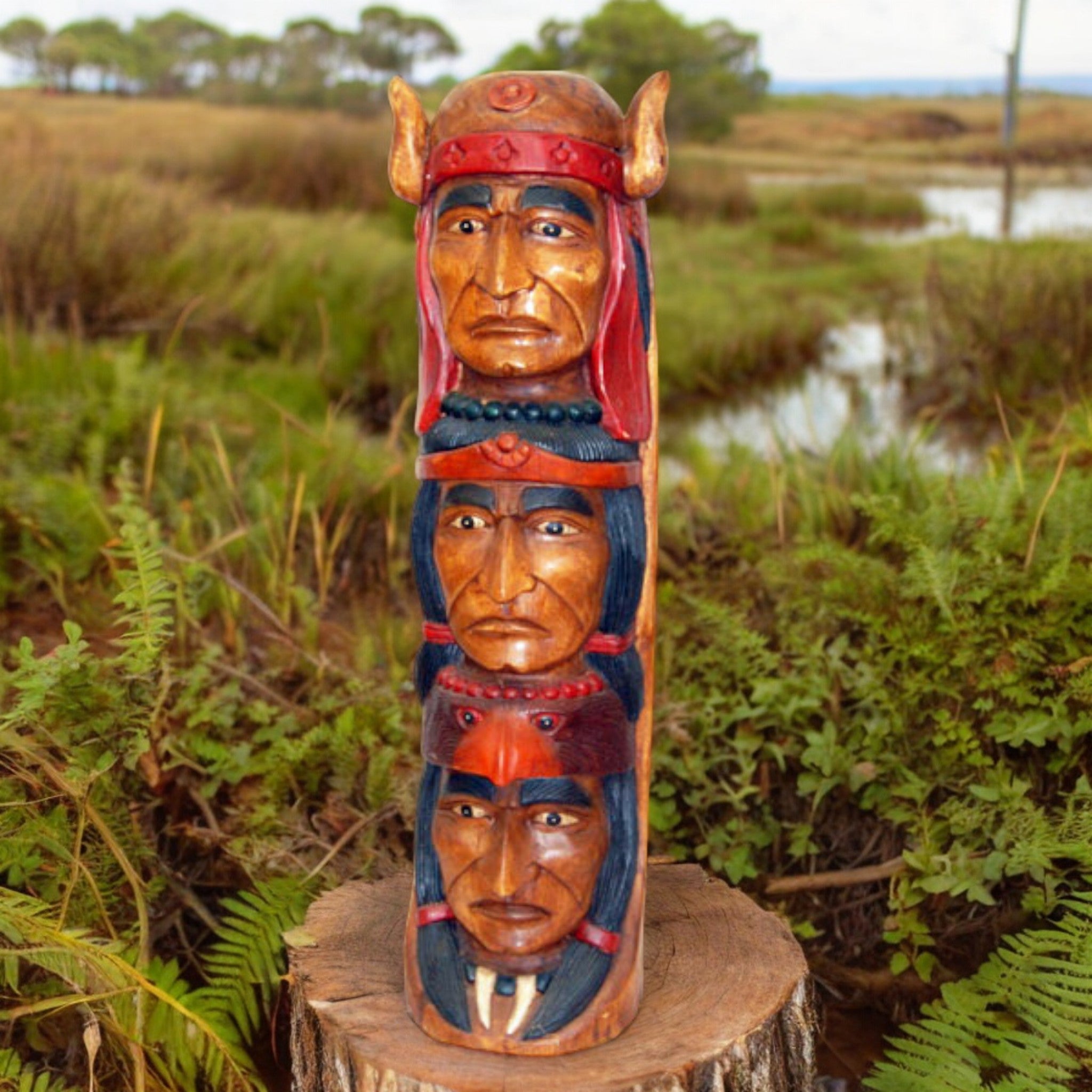 Hand carved Indians sold and hand carved picture