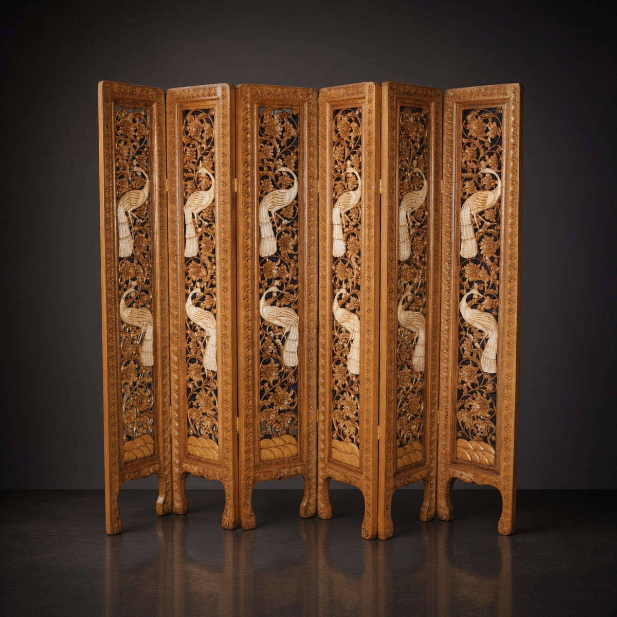 Six-panel teak room screen with carved peacocks