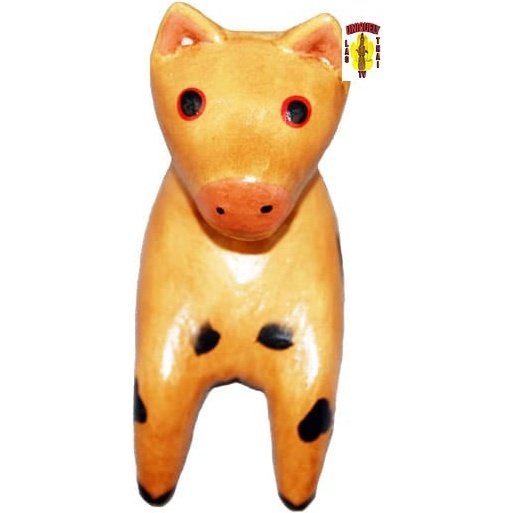 Carved Toy Cow Sitting Down